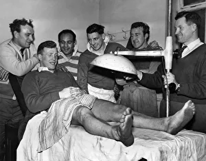 All smiles at Wigan as the treatment works'on the Keith Holden thigh