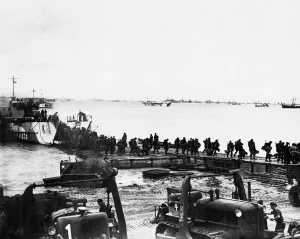 00203 Prints: Allied troops landing on a beach in Normandy France 1944 6th June 1944