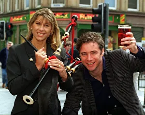 Ally McCoist Rangers football player holding up pint of beer