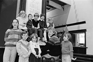 00523 Prints: Almondbury Methodist Junior Church Christmas Party, singing carols round the piano