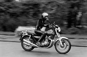 00044 Prints: Alvin Stardust on a motorbike. January 1976 75-00022A-018