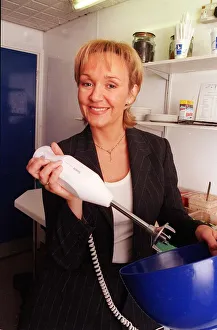 Amanda Reddington actress March 1998 is pictured holding a Bamix swiss made hand held