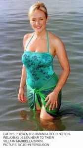Amanda Reddington TV Presenter GMTV relaxing in sea near their villa in Marbella Spain