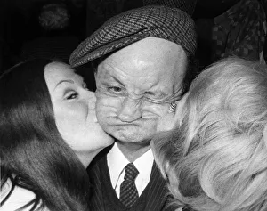 Amateur Gurner Joe Carter receives a peck on the cheek at an amateur talent contest