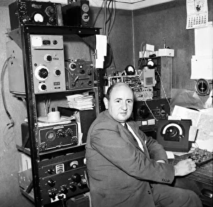 00013 Prints: Amateur Radio Norman Bennett, radio ham seen here with the transmitter