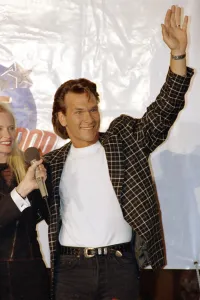 American actor Patrick Swayze arrives for the grand opening of the Planet Hollywood
