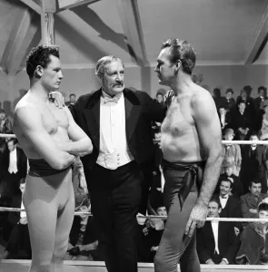 American actors Forrest Tucker and Maurice Bush in a scene from the Bare Knuckle Fighting