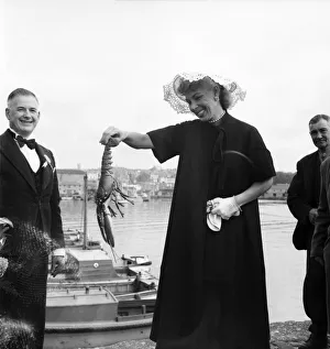 00012 Prints: American actress Dolores Gray at Plymouth holding a lobster. July 1952 C3853-001