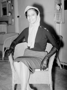 Scarves And Shawls Prints: American actress Dorothy Dandridge at Heathrow Airport. December 1956