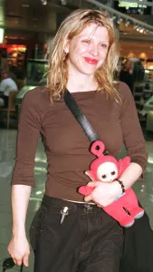 Teddy Bears Prints: American actress / singer Courtney Love October 1998 leaves Heathrow Airport after