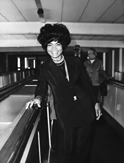 American actress and singer Eartha Kitt arriving at Heathrow Airport in London to have
