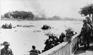 Us Army Prints: American Army troops cross the Pasig River which bisects Manila
