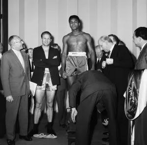 Weigh In Prints: American boxer Cassius Clay Aka (Muhammad Ali) and Britain