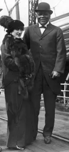 Bowler Hat Prints: American boxer Jack Johnston seen here on his arrival at Folkestone with his second wife