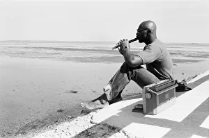 American boxer Marvin Hagler relaxes with a flute ahead of his title challenge against