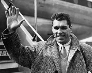 American boxer Walter Cartier photographed on his arrival at London Airport
