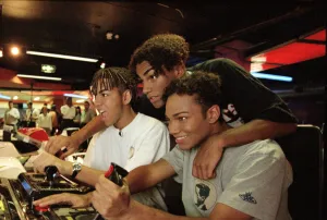 American boy band 3T playing video games at an Arcade 9th September 1996