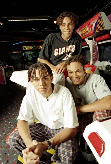 American boy band 3T playing video games at an Arcade 9th September 1996