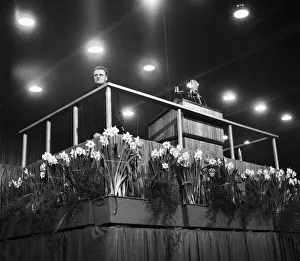 01163 Prints: American evangelist Billy Graham addressing a huge crowd of people at Kelvin Hall in