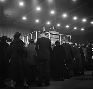 01163 Prints: American evangelist Billy Graham addressing a huge crowd of people at Kelvin Hall in