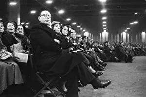 01163 Prints: American evangelist Billy Graham addressing a huge crowd of people at Kelvin Hall in
