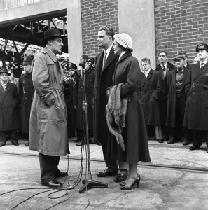 01163 Prints: American evangelist Billy Graham pictured with his wife Ruth upon arrival at Southampton