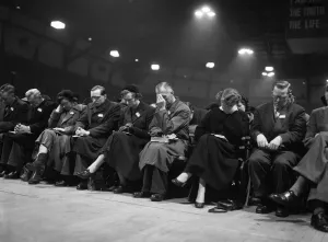 01163 Prints: American evangelist Billy Graham speaks to the crowd at the Harringay Arena in North