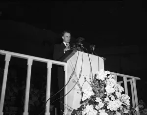 American evangelist Billy Graham speaks to a huge 12000 plus crowd at the Harringay Arena