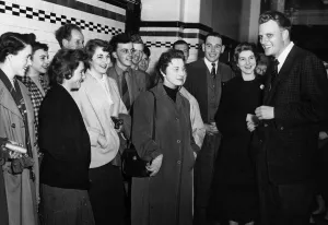 American evangelist Billy Graham speaks to students at Glasgow Technical College during