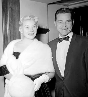 Square Prints: American Film Actress Barbara Payton wearing fur stole and muff at the Premiere of Film