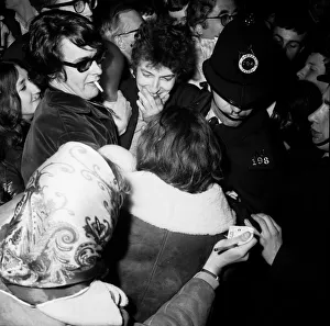 American folk legend Bob Dylan arriving at London airport with Joan Baez
