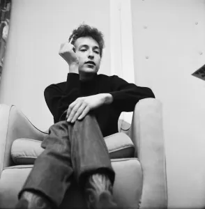 Cigarette Prints: American folk singer Bob Dylan smokes a cigarette in his hotel room during his visit to