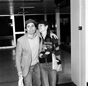American musician Paul Simon and actress Carrie Fisher at Heathrow airport. 24th May 1980
