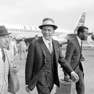 American musician and screen legend Frank Sinatra arrives at Heathrow airport