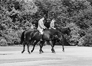 American President Ronald Reagan astride the horse Centennial riding with Queen Elizabeth
