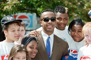 00753 Prints: American rapper MC Hammer visiting Stockwell Park Comprehensive school in south London