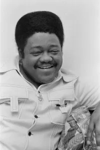 Moustaches Prints: American rock and roll singer and musician Fats Domino shows off his diamond rings in his