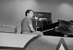 00337 Prints: American rock and roll singer and musician Jerry Lee Lewis performing on stage at a rock