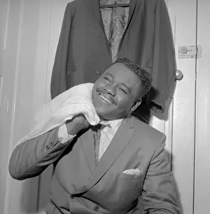American rock and roll star Fats Domino in the dressing room after preparing for
