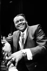 American rock and roll star Fats Domino at the piano on the stage of the Saville Theatre