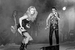 Suspenders Prints: American rock singer Alice Cooper performing in concert at the Hammersmith Odeon during