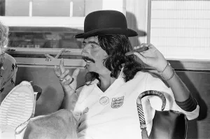 American rock singer Alice Cooper wearing a bowler hat and England football shirt