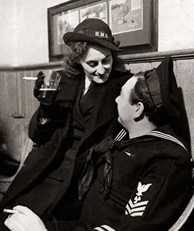 Wrens Prints: American sailor chatting to a Wren in a pub in Northern Ireland port