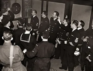 00190 Prints: American sailors challenge ARP personel to a game of dartsat the Cranley Arms Chelsea