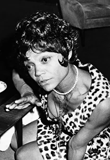 Necklace Prints: American singer and actress Eartha Kitt at Heathrow Airport as she arrives in the UK to