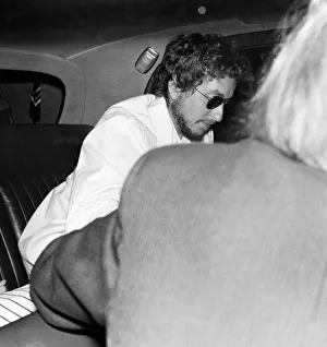 Arriving Prints: American singer Bob Dylan arrives at Londons Heathrow Airport ahead of his