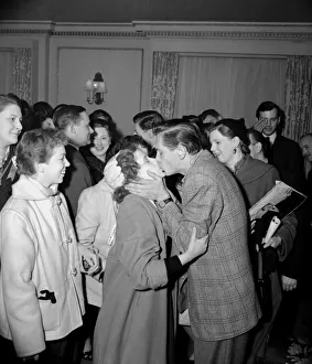 American singer Johnny Ray greeted by fans upon his arrival in England April 1955