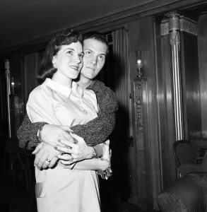 01115 Prints: American singer Pat Boone and his wife Shirley pictured a the Dorchester Hotel were they