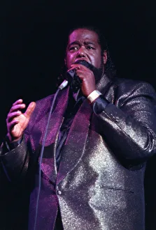 00105 Prints: American singer songwriter Barry White performing in concert. December 1988