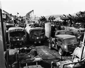 American vehicles loaded aboard landing ships in the river Dart during preparations for